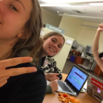 selfie photo of three college students during study session