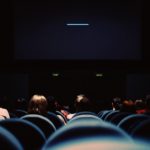 people sitting in a movie theater
