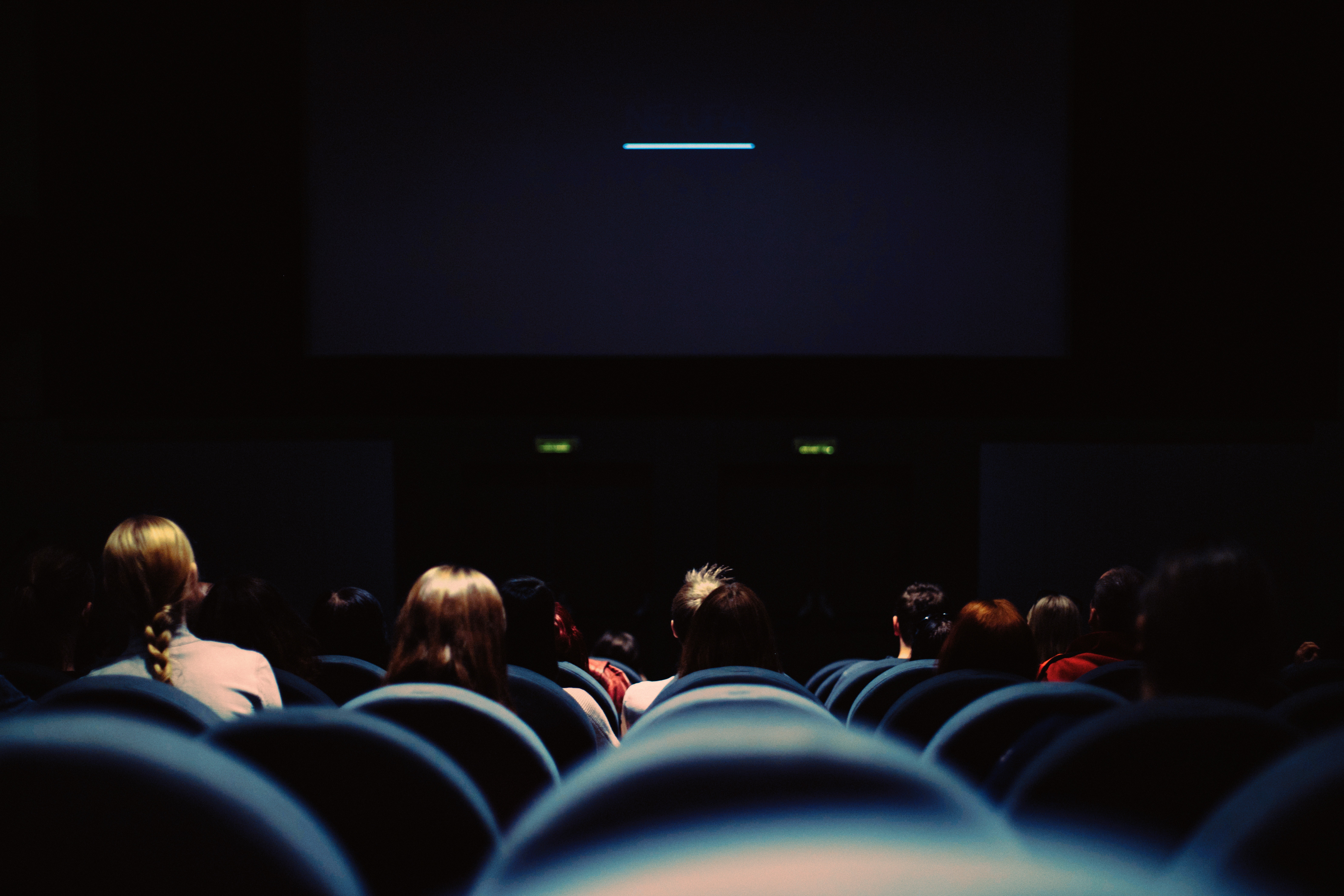 people sitting in a movie theater