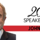 image of man in a suit with logo of 2024 speaker series